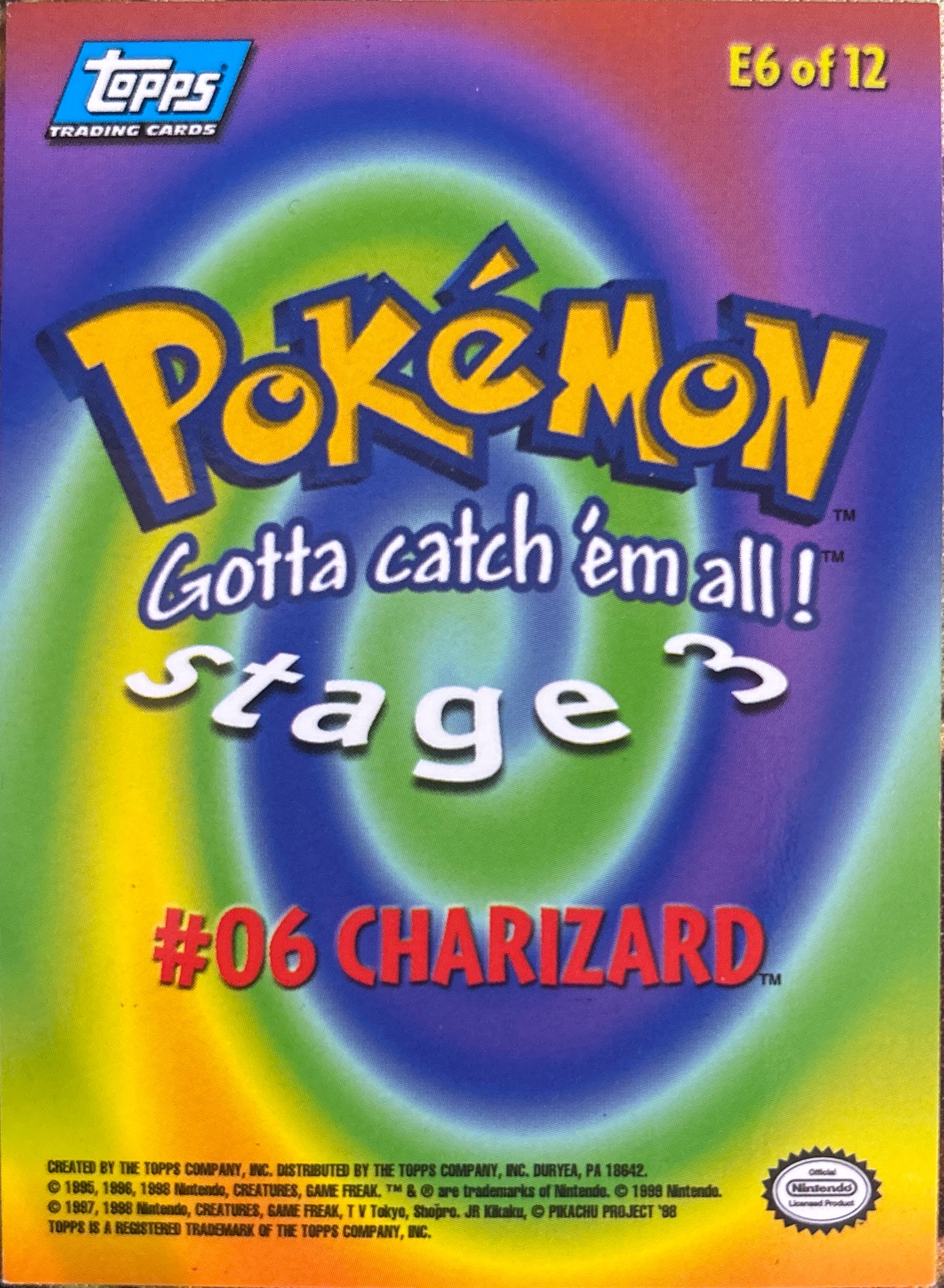 Charizard card #E6, Pokemon Topps First Movie Trading Cards (1999), back