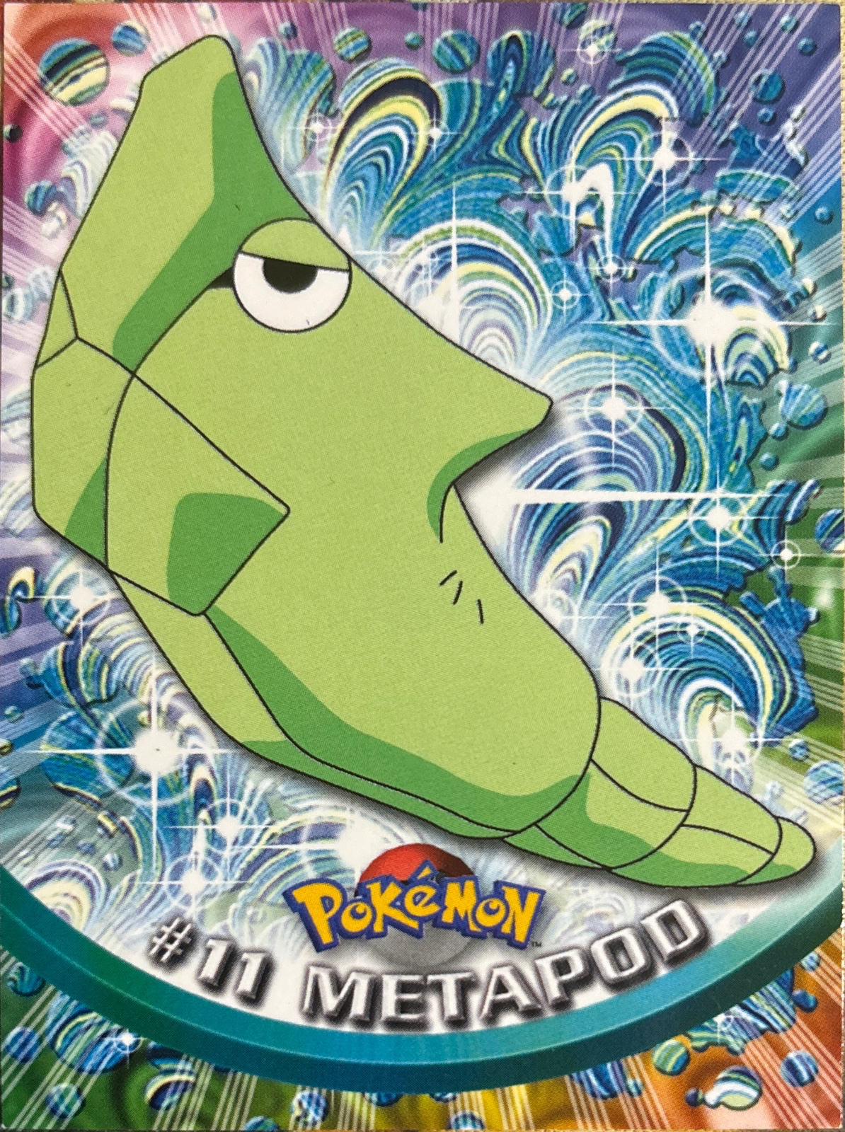 Metapod card #11, Pokemon Topps Series 1 (1999), front