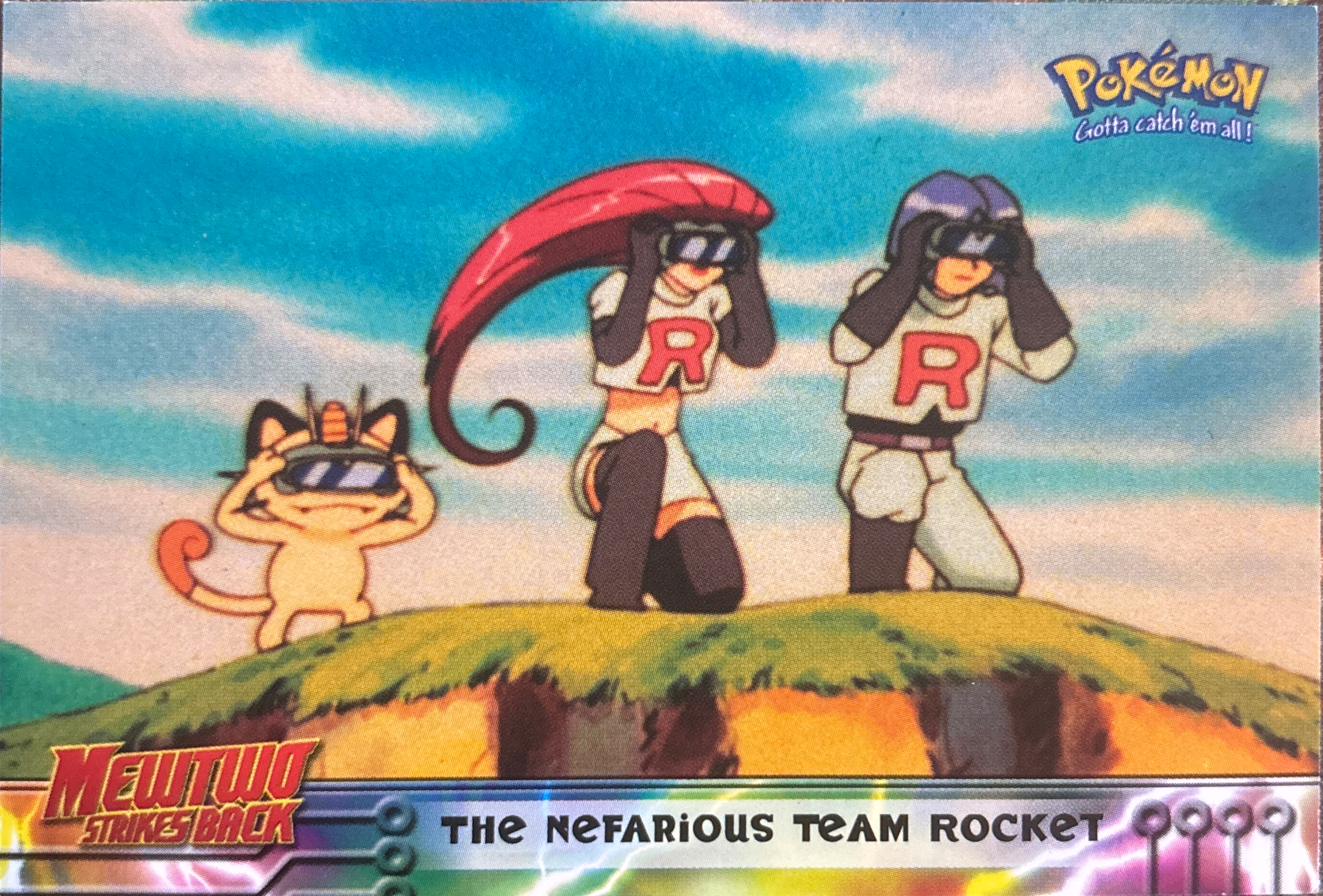 The Nefarious Team Rocket card #12, Pokemon Topps First Movie Trading Cards (1999), front