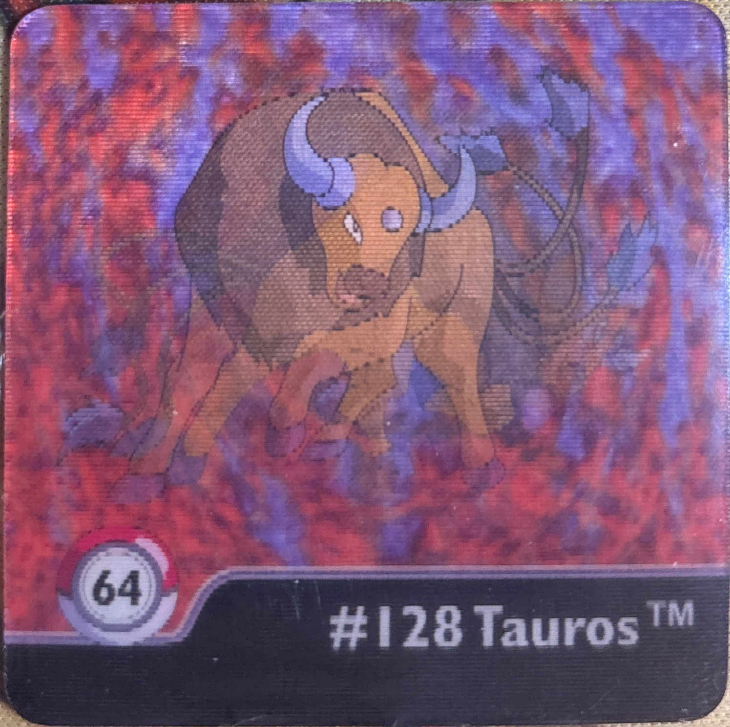 Tauros collectible #64, Artbox (USA) Pokémon Artbox Series 1 Flipz (1999), front