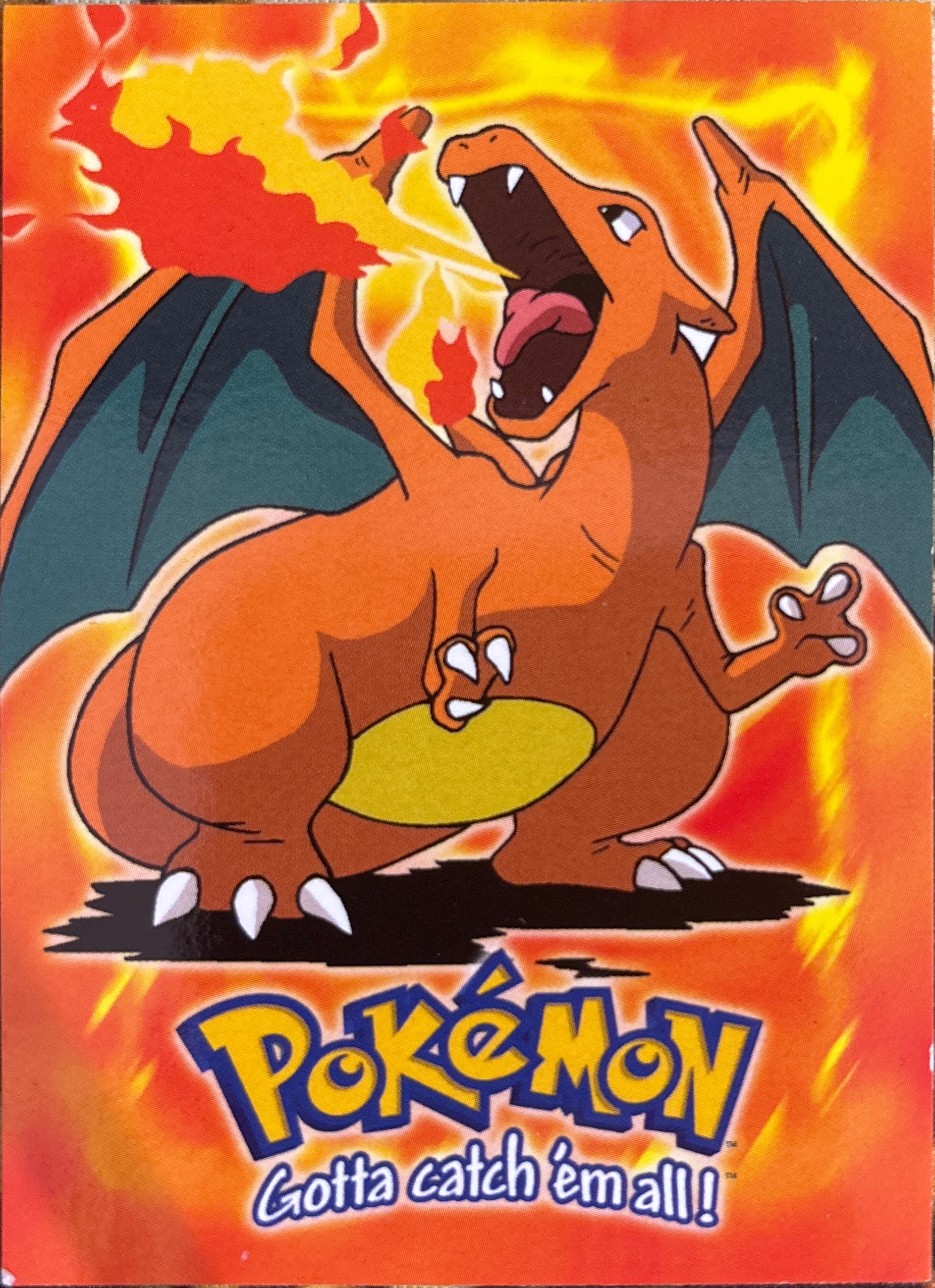 Charizard card #E6, Pokemon Topps First Movie Trading Cards (1999), front
