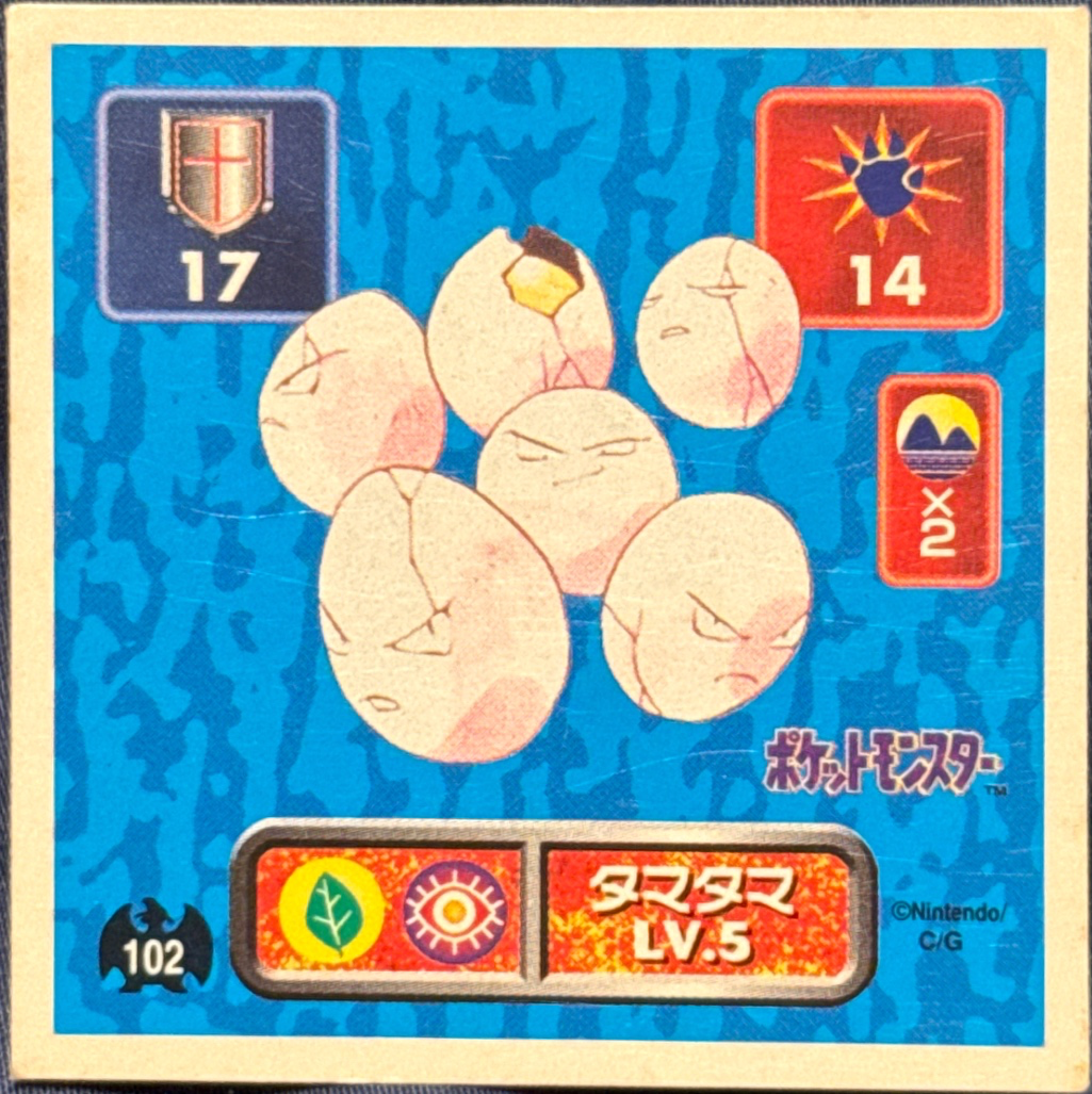 Exeggcute sticker #102, Pokémon Amada Hyper Sticker Collection 1 (1996), Non-Holo, front