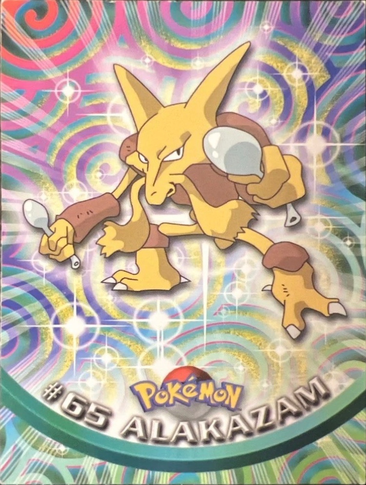 Alakazam card #65, Pokemon Topps Series 1 (1999), front